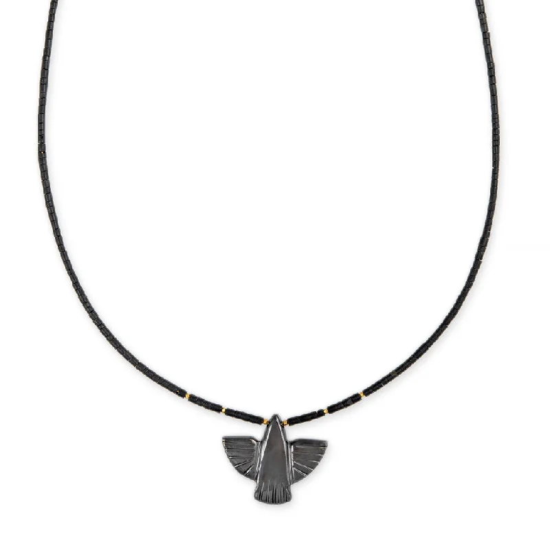 Women's couple necklaces-HEMATITE THUNDERBIRD + GOLD AND ONYX BEADED TOGGLE NECKLACE