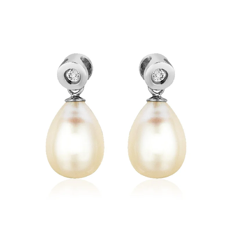 Women's sterling silver earrings-Sterling Silver Earrings with Pear Shaped Freshwater Pearls and Cubic Zirconias